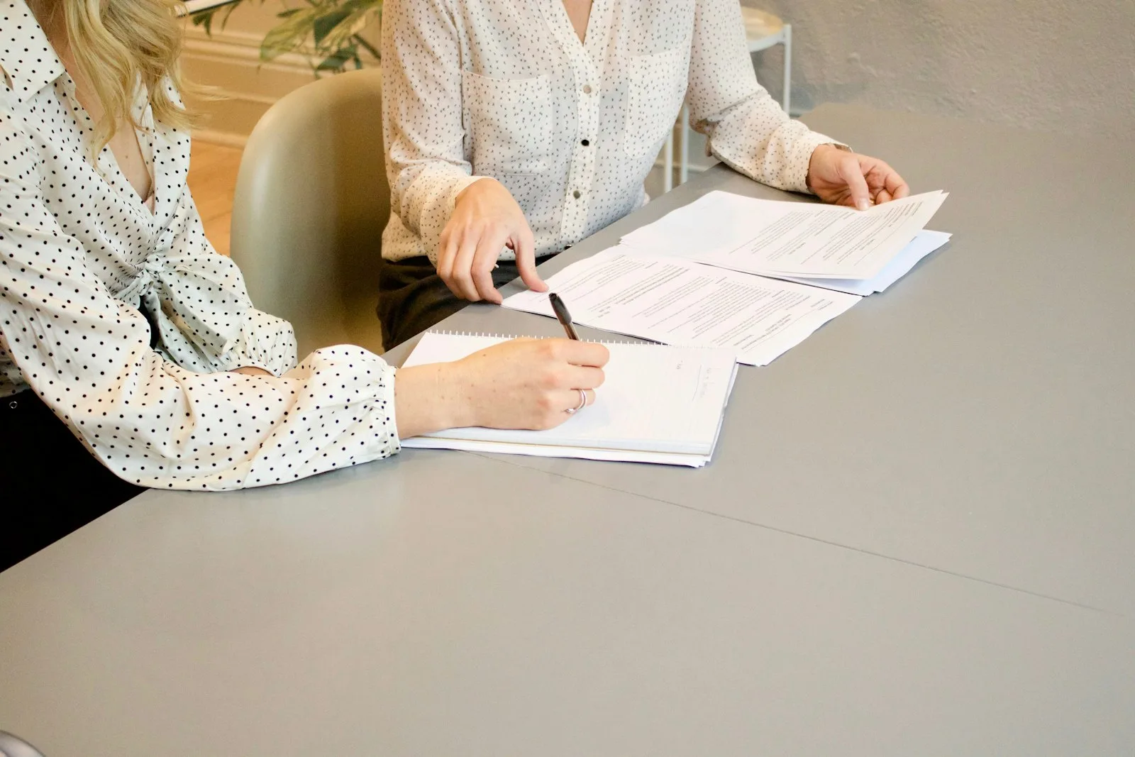 Family office investment advisory team reviewing wealth structuring documents