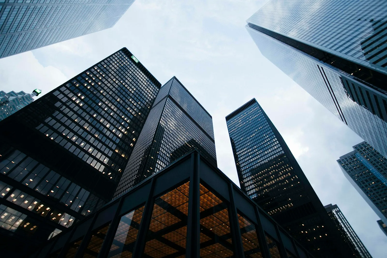 Real estate investment consultant reviewing a commercial high-rise skyline development